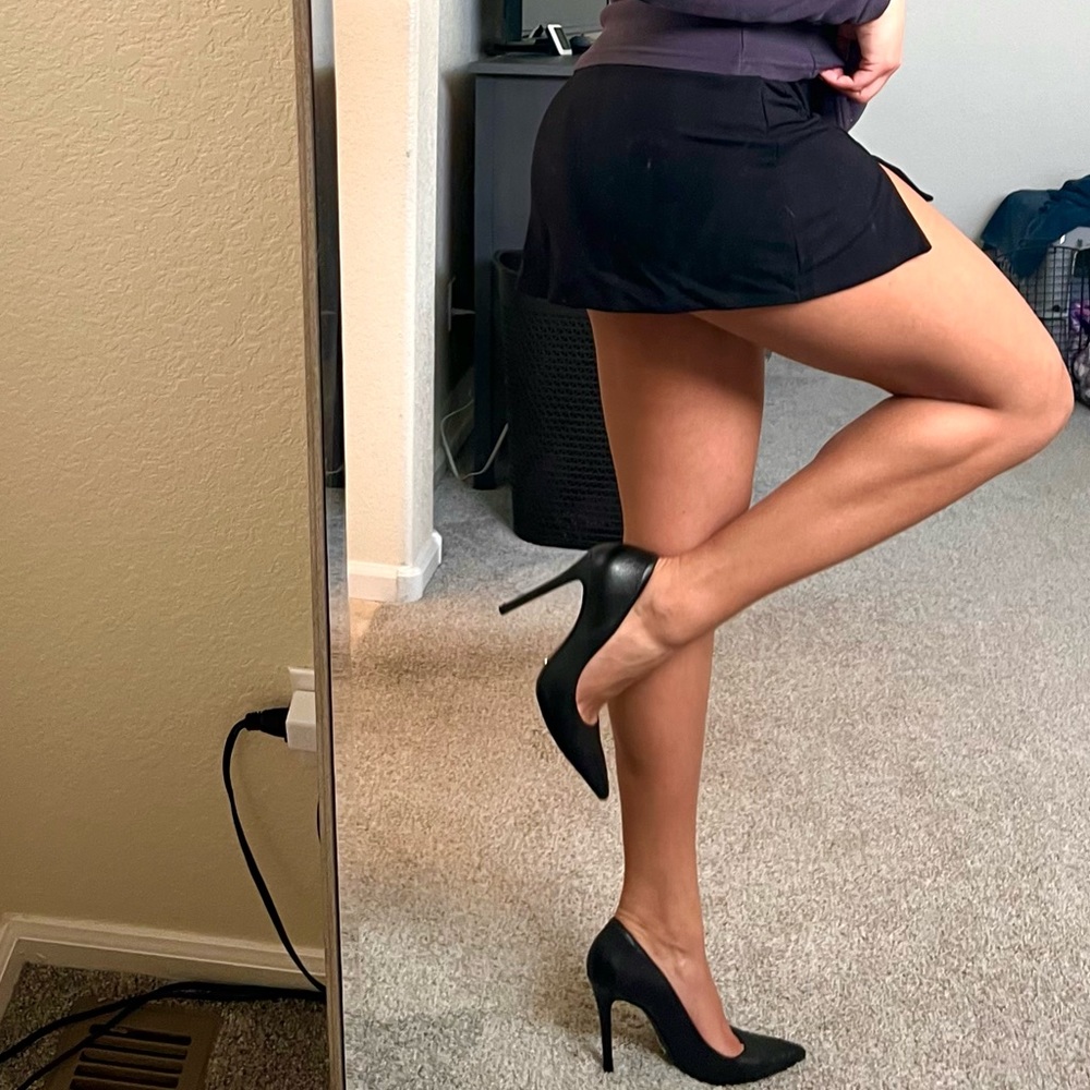 Black leather pumps